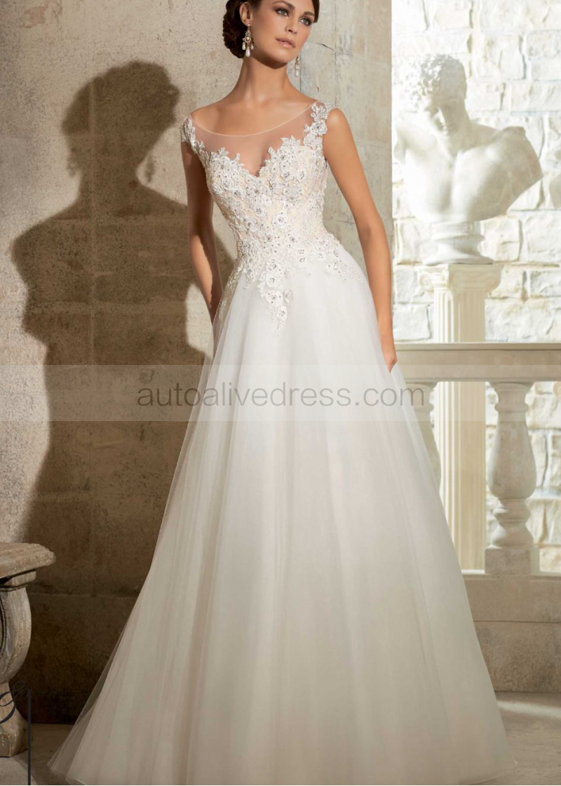 beaded lace and tulle wedding dress