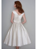 V Neck Beaded Ivory Satin Tea Length Wedding Dress With Pockets