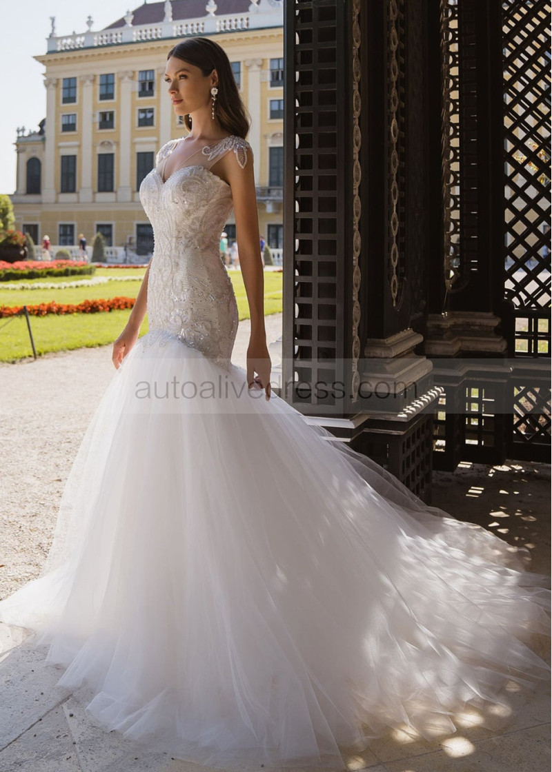 heavily beaded wedding dresses Classic And Elegant Pearl Beaded A line Train Wedding Dress With Sheer Sleeves 38